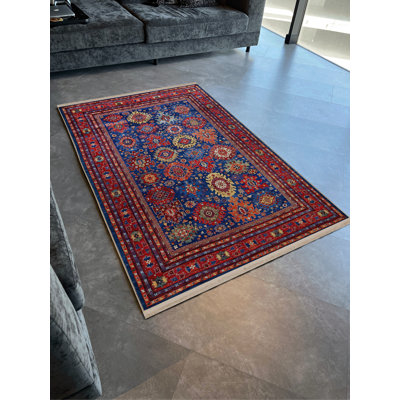 Tapis décoratif à motifs bleus et bourgogne