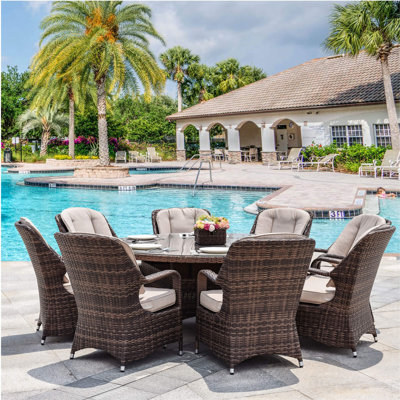 Parma 9-Piece Outdoor Dining Set with Round Table in PE Wicker and Cushions