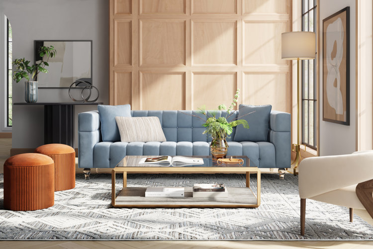 glam living room with a color scheme of ivory, beige, light blue, and an accent of burnt orange