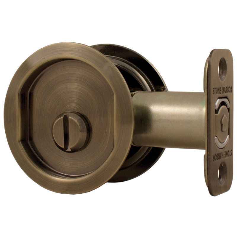 Serrure ronde pour porte escamotable, Laiton antique