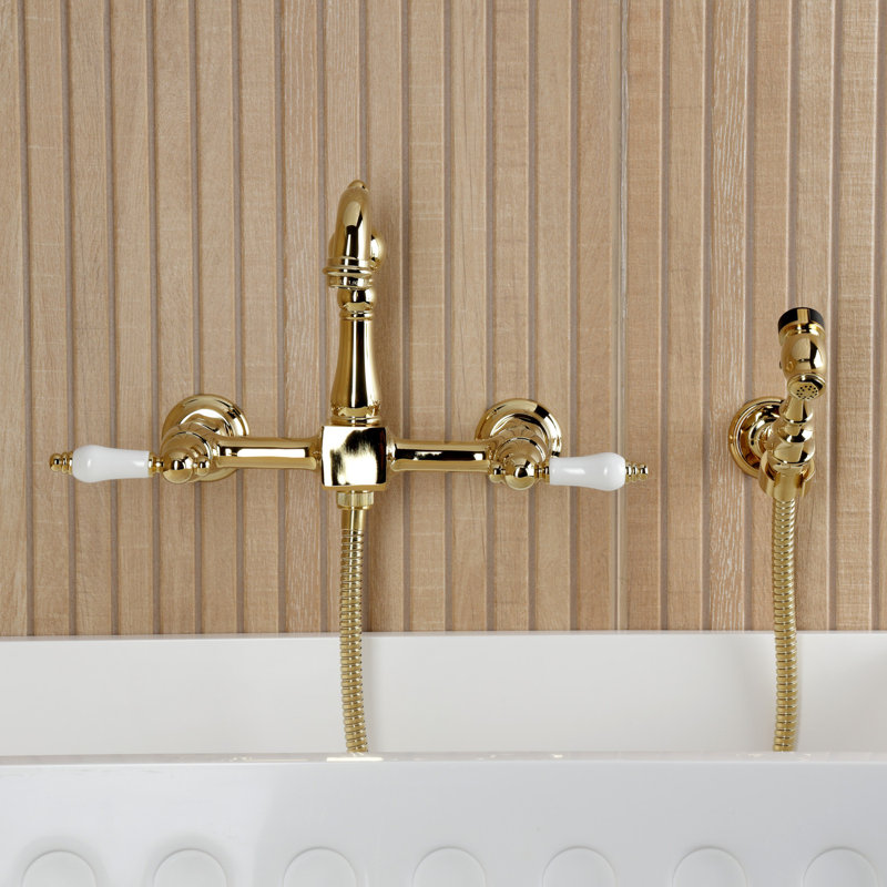 Kingston Brass Heritage Double-Handle 3-Hole Wall-Mount Bridge Kitchen Faucet With Brass Sprayer, Polished Brass