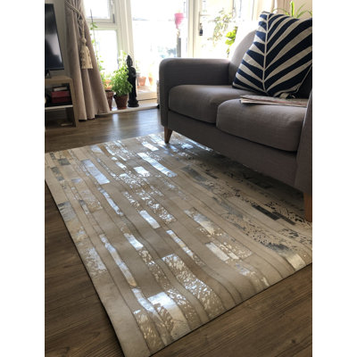 Mckinney Patchwork Cowhide Area Rug
