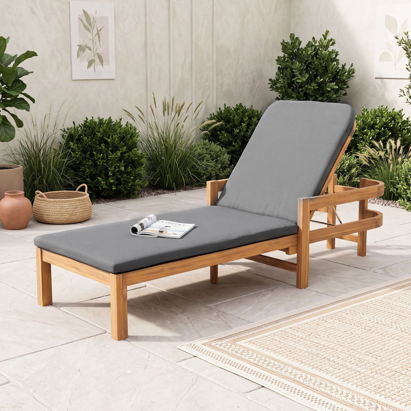 Chaise longue d'extérieur moderne en bois d'acacia avec dossier réglable et coussin résistant aux intempéries