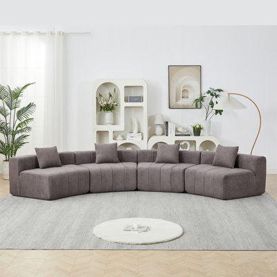 Curved Sectional Sofa With 4 Pillows