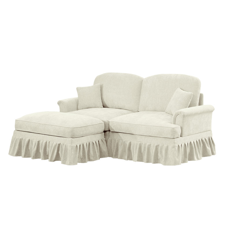 Élégant canapé Mid-Century modulaire à deux places en forme de L avec accoudoirs évasés et volants amovibles, jupes plissées et pieds fuselés
