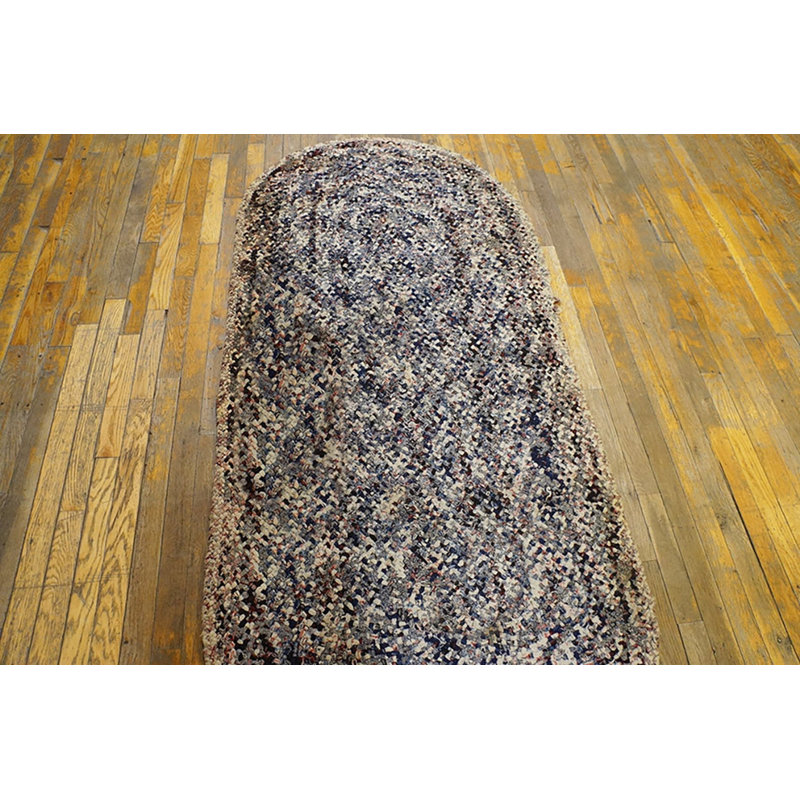 Tapis multicolore en laine tressé antique