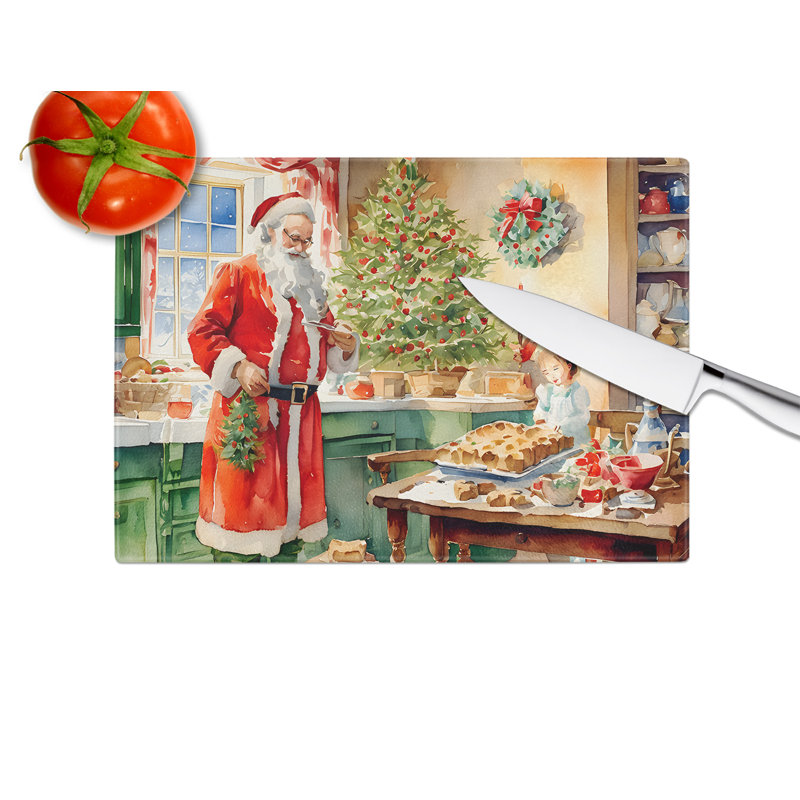 Planche à découper en forme de biscuits avec père Noël