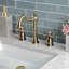Robinet de salle de bain à deux poignées et à 3 trous à fixation sur comptoir avec bonde mécanique Kingston Brass-70060750