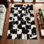 Tapis noir en peau de vache patchwork_9,5 X 13,5 F-1842147037