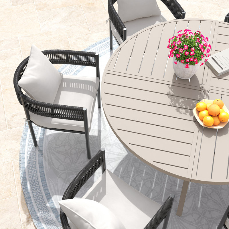 Ensemble de salle à manger d'extérieur avec table ronde de 60 po et 6 chaises rembourrées Pimarella, Sandshell/Beige