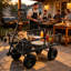 Chariot de jardin: Chariot à chariot noir conçu pour transporter facilement le bois de chauffage et les charges de jardin.