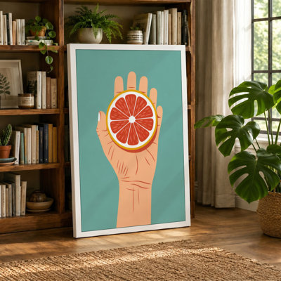 Hand Holding Grapefruit Minimalist - Wrapped Canvas
