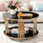 A Luxurious Black Glass Round Coffee Table With An Asymmetrical Metal Design And A Gilded Drum-Shaped Base, Featuring A Lower Storage Shelf.