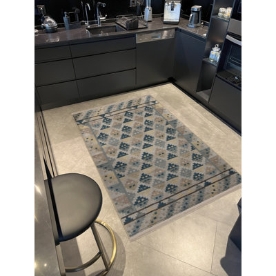 Tapis décoratif beige à motif géométrique scandinave