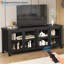 Meuble télé 65 po avec 4 portes coulissantes en verre, armoire de rangement, console multimédia Mid-Century, noir