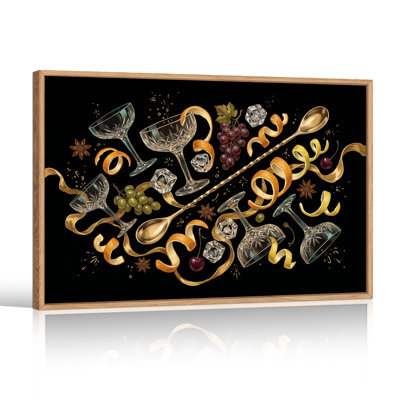 Verre à cocktail et écorces d'agrumes sur toile noire