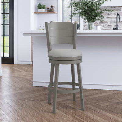 Authement Swivel Upholstered Counter Stool with Solid Wood Frame