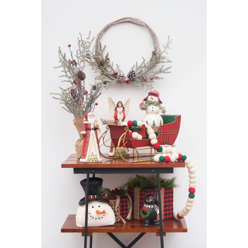 Figurine bonhomme de neige avec chapeau rayé