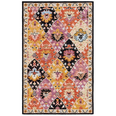 Fredick Tufted Wool/Cotton Southwestern Rug in Yellow/Black/Pink