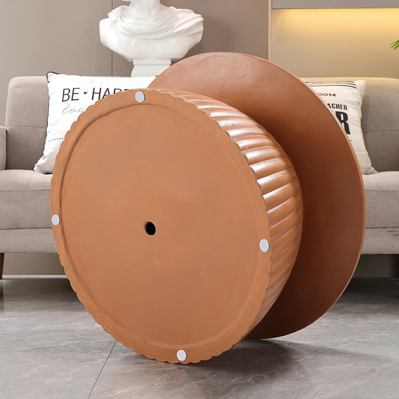 Table basse à base cannelée en oxyde de magnésium durable, parfaite pour les espaces de vie modernes et peu encombrants