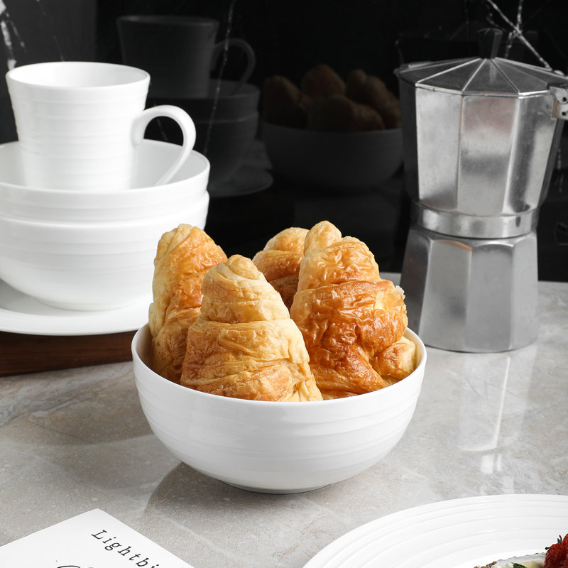 Elegant White Porcelain 16-Piece Dinnerware Set with Swirl Design