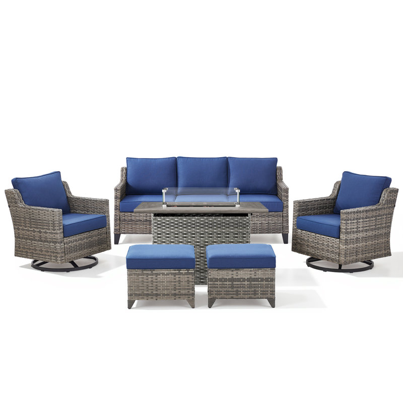 Maelie 6-Piece Outdoor Wicker Patio Fire Pit Conversation Set With Rectangle Fire Pit, Swivel Gliders And Ottomans, Blue