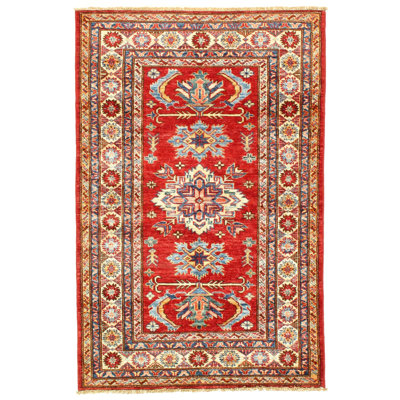 Lovall Wool Oriental Area Rug in Rust