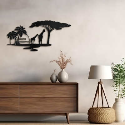 Arbres et girafes au coucher du soleil