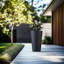 Pot à fleurs moyen rond en béton avec trous de drainage-112254376-112254383