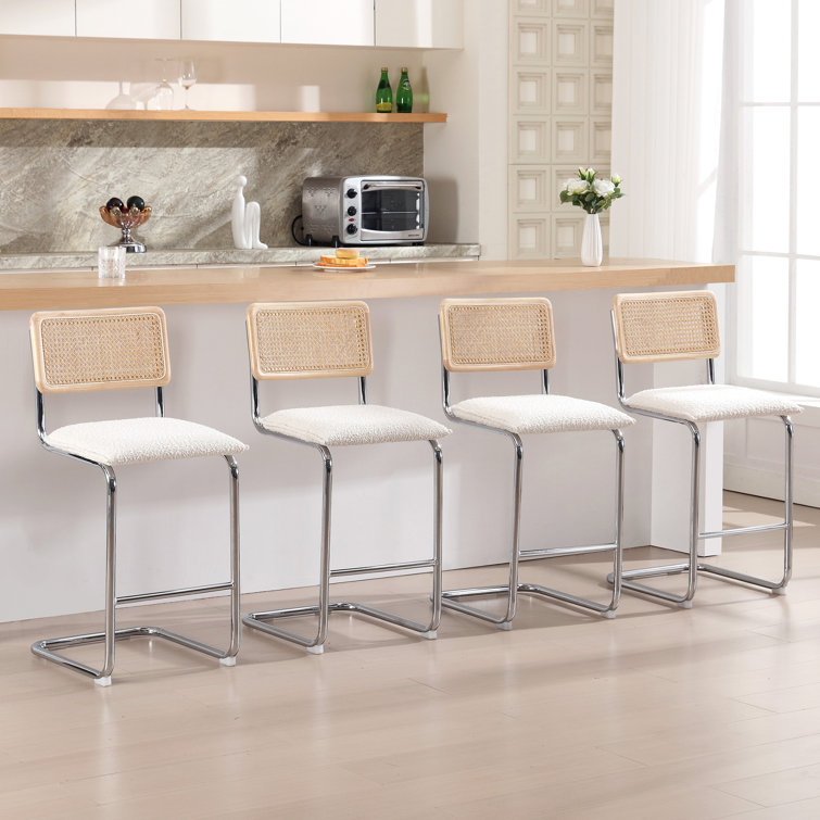 Ambrine Low Back Boucle Upholstered Counter/Bar Stool with Rattan Back and Steel Sled Frame