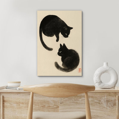 Minimaliste chats noirs dans un style pinceau sur fond beige - impression sur toile encadrée