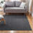 TOWN & COUNTRY BASICS Pax Herringbone Textured Solid Machine Washable Area Rug Black-101377604