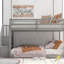 Lit simple superposé au-dessus d'un plancher gris avec rangement - Fonction pratique et confortable-1772331329
