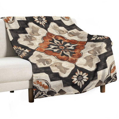 Jeté en flanelle de luxe à motif floral orné de tons chauds, couverture douce et chaude pour le canapé-lit du salon