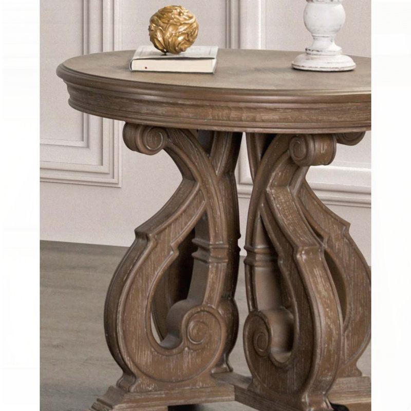 Table de bout ronde traditionnelle - finition chêne vieilli, pieds à volutes, détails sculptés
