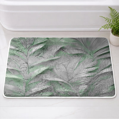 Tapis de bain texturé à motif de feuilles
