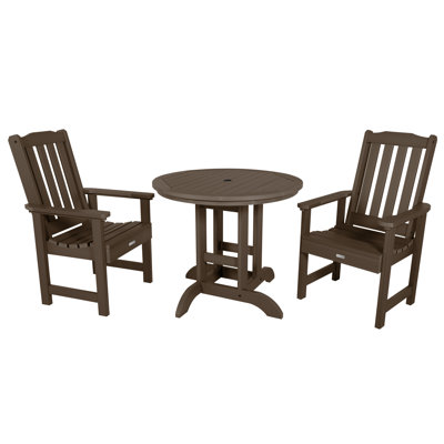 Arbnora 4 - Person Patio Dining Set with Round Table