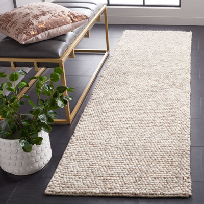 Natura Solid Color Area Rug In Beige