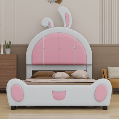 Lit plateforme tapissier avec tête de lit en forme de lapin