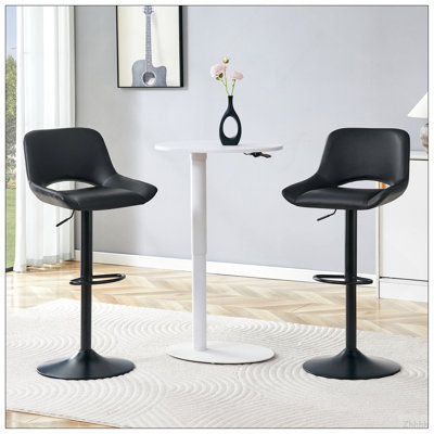 Ensemble de 2 tabourets de bar réglables Modern Modern, matériau en polyuréthane noir, avec repose-pieds, peut supporter jusqu'à 250 lb, convient aux bars à la maison et aux îlots de cuisine.