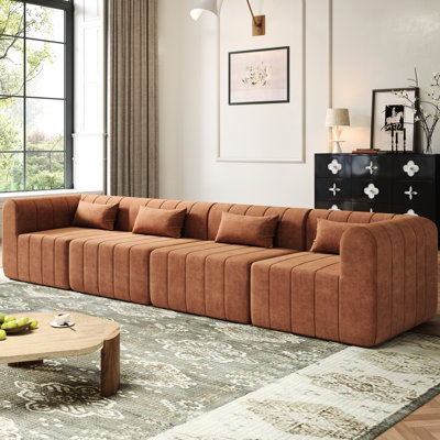 Canapé d'angle orange capitonné de 145,5 pouces, modulable en 4 parties, 3 configurations, mousse haute densité, doux et antitache, montage facile pour les espaces de vie, design configurable, revêtement en cuir, aucun assemblage requis