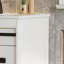 Farmhouse-Style Bathroom Vanity Set With Sliding Barn Door Cabinets, Storage Drawers, And A Small Single Basin Design.