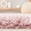 Tapis rose / blanc à motif géométrique rectangulaire en polypropylène tissé à la machine 4 pi x 6 pi Dawayne