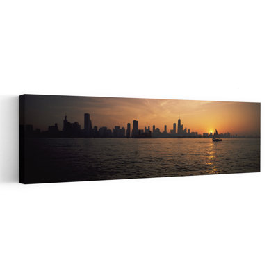 Silhouette Of Buildings At The Waterfront Navy Pier Chicago Illinois USA by Vito Palmisano - Wrapped Canvas Panoramic Print