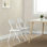 Chaises pliantes en métal avec chaises en cuir pliables en polyuréthane blanc