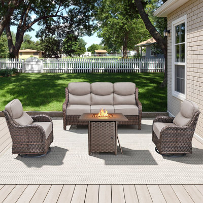 Ensemble de conversation extérieur en osier pour 5 personnes avec canapé, fauteuils pivotants, pouf et foyer