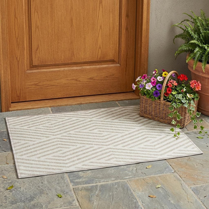 2' X 3' Beige and Ivory Geometric Washable Non Skid Indoor Outdoor Area Rug