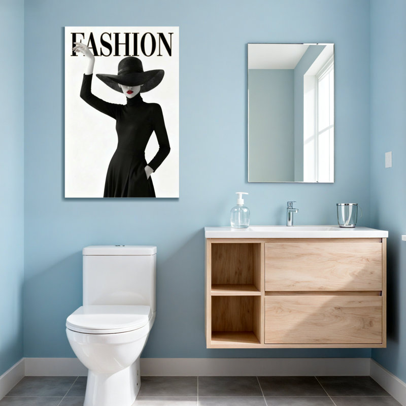 Mannequin en robe noire et chapeau