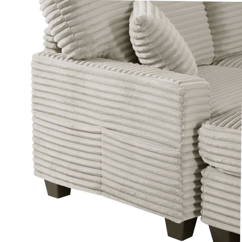 Canapé modulaire polyvalent en forme de U avec repose-pieds mobile et poches de rangement latérales, parfait pour les salons modernes