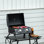Barbecue portatif, 2 brûleurs au gaz. Pieds pliables, couvercle, thermomètre. Noir, idéal pour le camping, le pique-nique, le barbecue au propane, portable et compact. Fumée